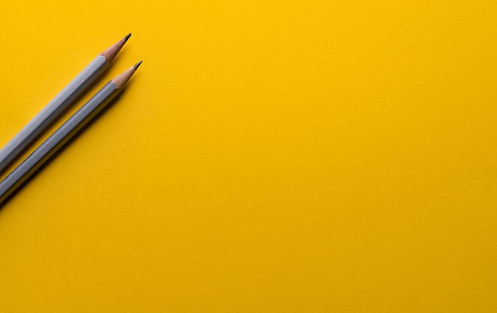 Pencils with yellow background