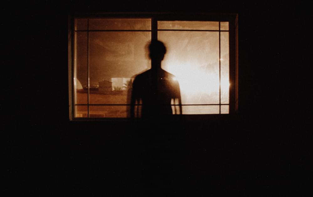 Shadow figure outside window