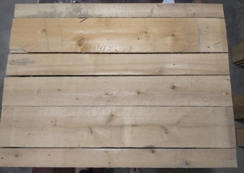 Planks of wood laid on frame